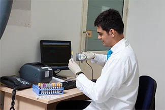 Laboratory technician handling diagnostic test samples